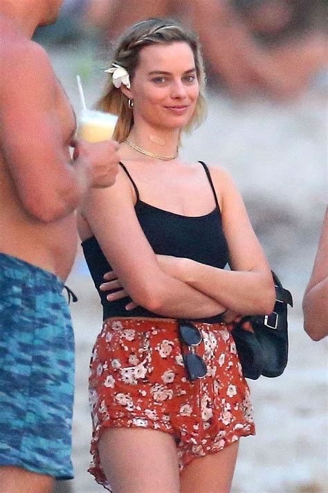 margot robbie sexy images|Margot Robbie strips down to her bikini for wild 4th of。